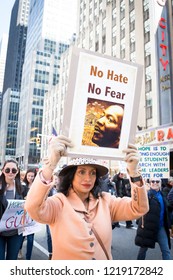 March For Our Lives: A Woman Holds A Sign That Says No Hate No Fear Above A Picture Of Martin Luther King Jr During The March To End Gun Violence On 6th Ave, NEW YORK MAR 24 2018.