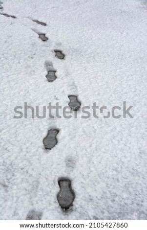 Similar – Barefoot tracks in the snow