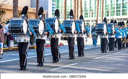 Marching band with drums dressed in blue - Shutterstock ID 1885572034