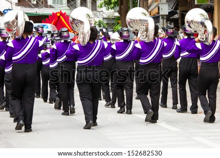 marching band during parade on the celebration