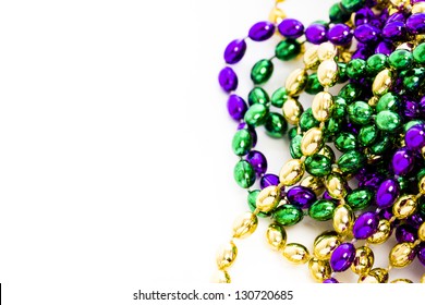 Mardi Gras Beads On White Backgound.