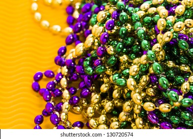 yellow mardi gras beads