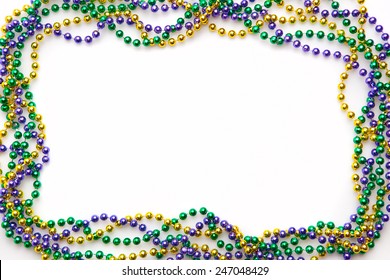 Mardi gras frame of three colours of beads 
