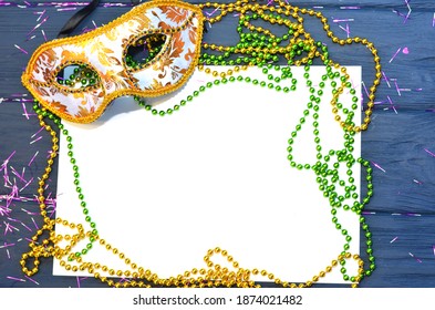 Mardi Gras Mask And Beads Frame For Text On White Space Background. Madi Gras Celebration Fat Tuesday Carnival