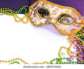 Mardi Gras Mask And Beads Frame For Text On White Space Background. Madi Gras Celebration Fat Tuesday Carnival