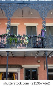 Mardi Gras Mask Hangs On Balcony Of Downtown House