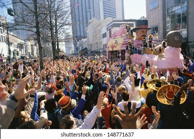 MARDI GRAS, NEW ORLEANS, LA - CIRCA 1990's: Crowd Watching Parade In New Orleans