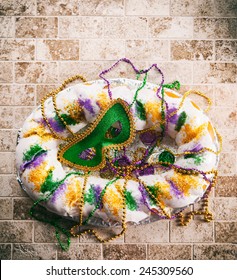 Mardi Gras: Overhead Of Traditional Holiday King Cake With Copyspace
