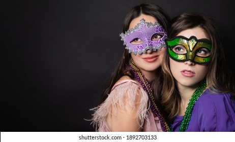 Mardi Gras People. Women With A Carnival Mask And Beads On The Black Background With Copy Space.