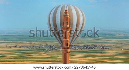 Mardin Sehidiye Mosque with Hot air balloon fly over spectacular Mesopotamia - Mardin, Turkey