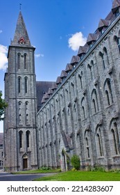 Maredsous Abbey From Outside: Majestic Grey Brick Building