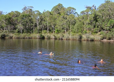MARGARET RIVER, WA - JAN 20 2022:Australian People Swiming In Margaret River During Summer Holiday Vacation.Margaret River Is A Popular Travel Destination In South Western Australia
