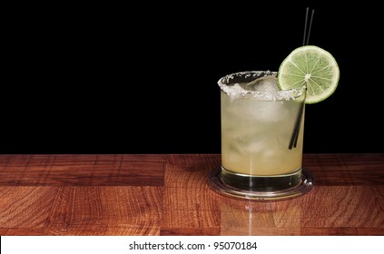 Margarita On The Rocks On A Bar Top Isolated On A Black Background