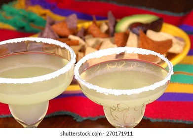 Margaritas With Platter Of Corn Chips On Mexican Table Cloth. Ready For A Cinco De Mayo Project.