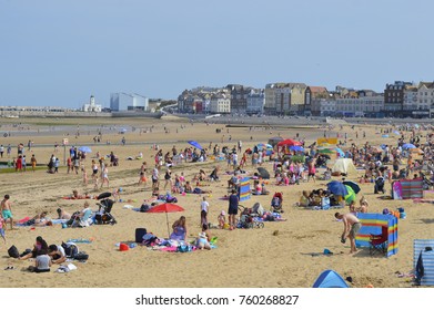 MARGATE, UK- AUGUST 28: Visitors flock to Margate Main Sands, voted one of the best beaches in Britain and enjoy the sunshine on the August Bank Holiday. August 28, 2017. Margate, Kent UK.