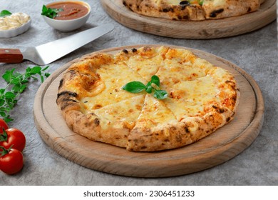 Margherita pizza with mozzarella cheese, baked on a wood-burning oven, with tomato sauce, cheese and basil, on gray background 8 - Powered by Shutterstock