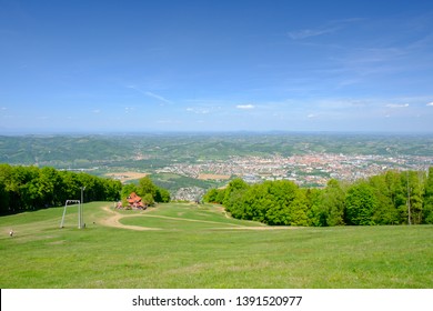 Mariborsko Pohorje, Panoramic View Of Maribor, Slovenia From Pohorje, Mountain Hut Luka In Front, Outdoor Spring And Summer Recreation And Hiking On Ski Slopes Of Slovenia