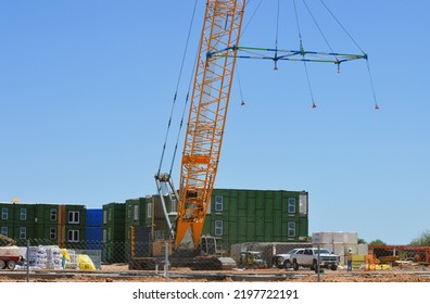 Maricopa, Arizona - September 02 2022: A Large Crane Is Used To Lift Pre-fabricate  Modular Room Sections At A  Construction Site For A New Apartment Complex Being Built On The City's West Side.