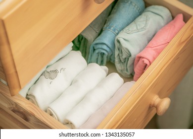 Marie Kondo Tyding Up Method Concept - Folded Clothes, Copy Space