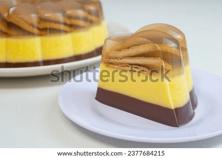 Marie Regal layered pudding or layered pudding with biscuits on top. served on a plate