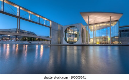 The Marie-Elisabeth-Lueders-Haus and skybridge in Berlin's government district at night. - Powered by Shutterstock