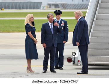 MARIETTA, GA- SEPTEMBER 25, 2020: President Donald Trump Greets Georgia Governor Brian Kemp And Georgia First Lady Marty Kemp Upon Exiting Air Force One At Dobbins Air Reserve Base.