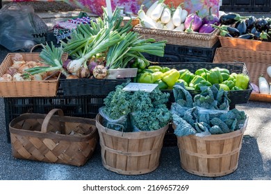 Marietta, Georgia USA - 06 18 2022:  Baskets Of Fresh Vegetables And Other Healthy Produce For Sale At An Outdoor Farmers Market