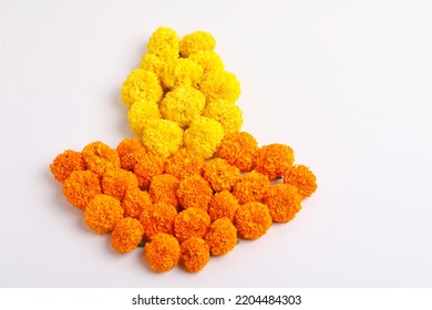 Marigold Flower Rangoli Design In Oil Lamp Shape.