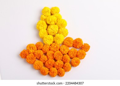 Marigold Flower Rangoli Design In Oil Lamp Shape.