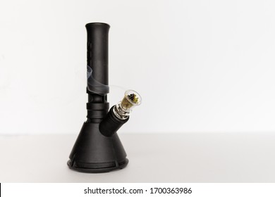 A Marijuana Bong Against A White Background