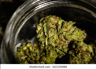 Marijuana Buds In A Jar Ready For A Consumer.  Marijuana Reform Is Gaining Momentum In The United States And Around The World.