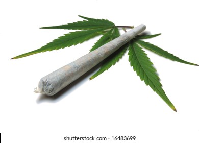 Marijuana cigarette with cannabis leafs isolated