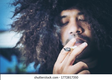 Marijuana joint in the hand, Concepts of medical marijuana use and legalization of the cannabis.selective focus