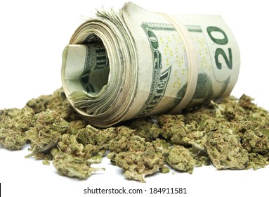 Marijuana And Money On White 