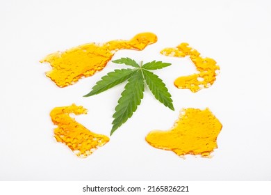 marijuana resin concentrate, yellow amber color cannabis wax.