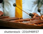 Marimba keyboard made of Hormigo wood, the national instrument of Guatemala, melodies and traditional sound in todaca for men at a party or celebration.