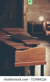 Marimba With Music Folder On Top Sitting Backstage At A Concert Venue. 