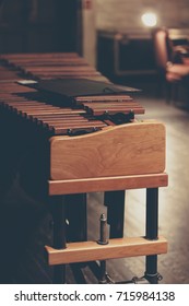 Marimba With Music Folder On Top Sitting Backstage At A Concert Venue. 