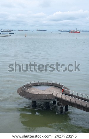 The Marina Barrage, a dam across the mouth of the Marina Channel to form The Marina Reservoir, Singapore