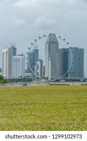 MARINA BARRAGE, SINGAPORE - JANUARY 26: It's A Main Dam And Multi-purpose Attraction. On Rooftop Perfect For Kite Flying As A Stunning Backdrop Of Downtown Singapore's Architecture On Jan 26, 2019