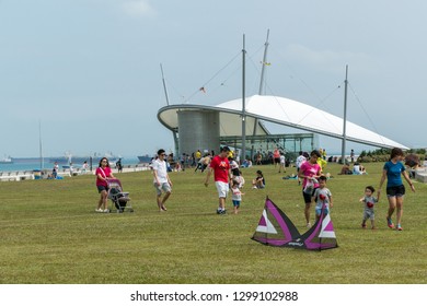 MARINA BARRAGE, SINGAPORE - JANUARY 26: It's A Main Dam And Multi-purpose Attraction. On Rooftop Perfect For Kite Flying As A Stunning Backdrop Of Downtown Singapore's Architecture On Jan 26, 2019