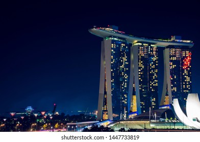 Marina Bay, Singapore - December 07, 2012: Marina Bay Sands Singapore Skyline Cityscape Around Marina Bay At Night. Close Up View.