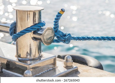 Marina bollard (bitt) at jetty for boats, ships and yachts mooring