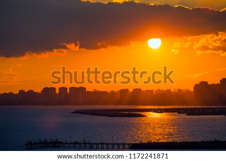 Marina with docked yachts at sunset - Sunset over marina with boats - Mersin, Turkey