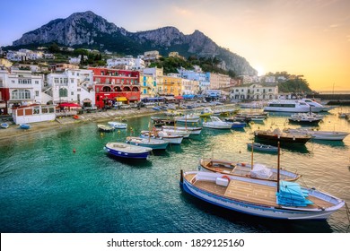 Marina Grande port on Capri Island, Naples, Italy, on dramatic sunset - Powered by Shutterstock