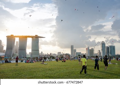 Marina, Singapore - 2010 April, 25: Singaporeans Flying A Kite On Weekend At Marina Barrage Singapore