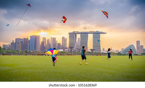 Marina, Singapore - 2018 March, 18: Singaporeans Flying A Kite On Weekend At Marina Barrage Singapore