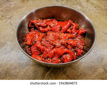 Marinated Beef Strips In A Metal Container Prepared For Drying And Making A Beef Jerky