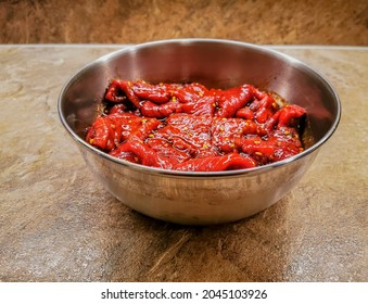 Marinated Beef Strips In A Metal Container Prepared For Drying And Making A Beef Jerky