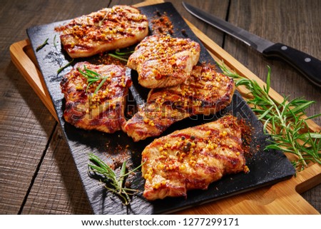 Marinated boneless tender pork chops, close up